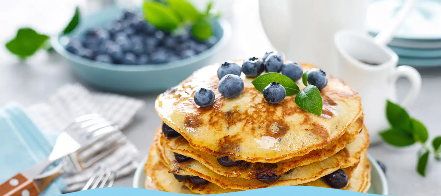 Blueberry pancakes with butter,